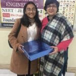 Dashmesh Academy NEET achiever being honored by faculty for exceptional performance in medical entrance exams.