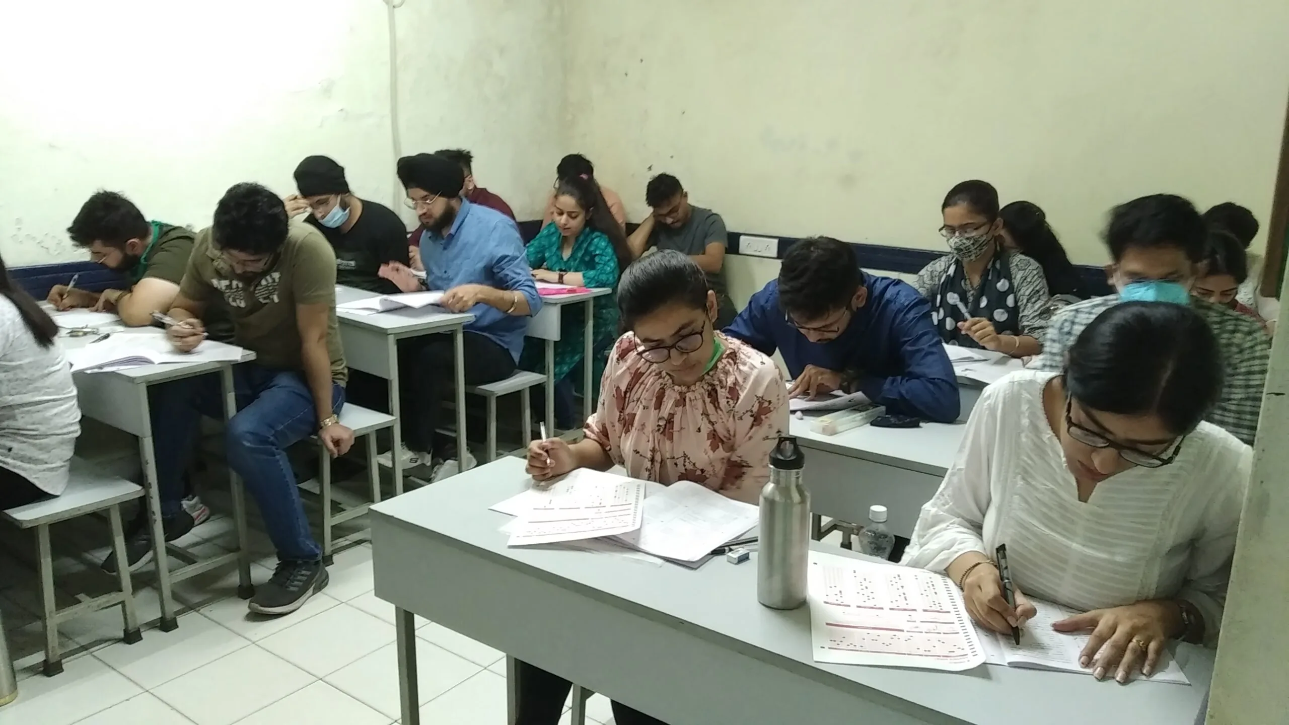 Students at Dashmesh Academy focusing on concept-based learning in the classroom during competitive exam preparation